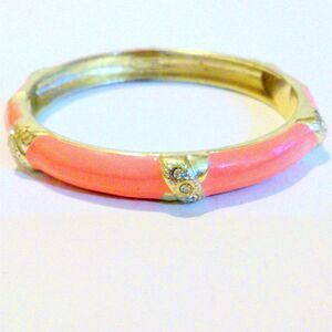 Signed Gold Tone Pink Enamel Hinged Bangle Bracelet